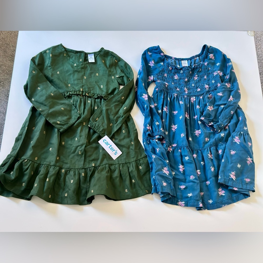 2 Carter‘s dresses size 6 and 7